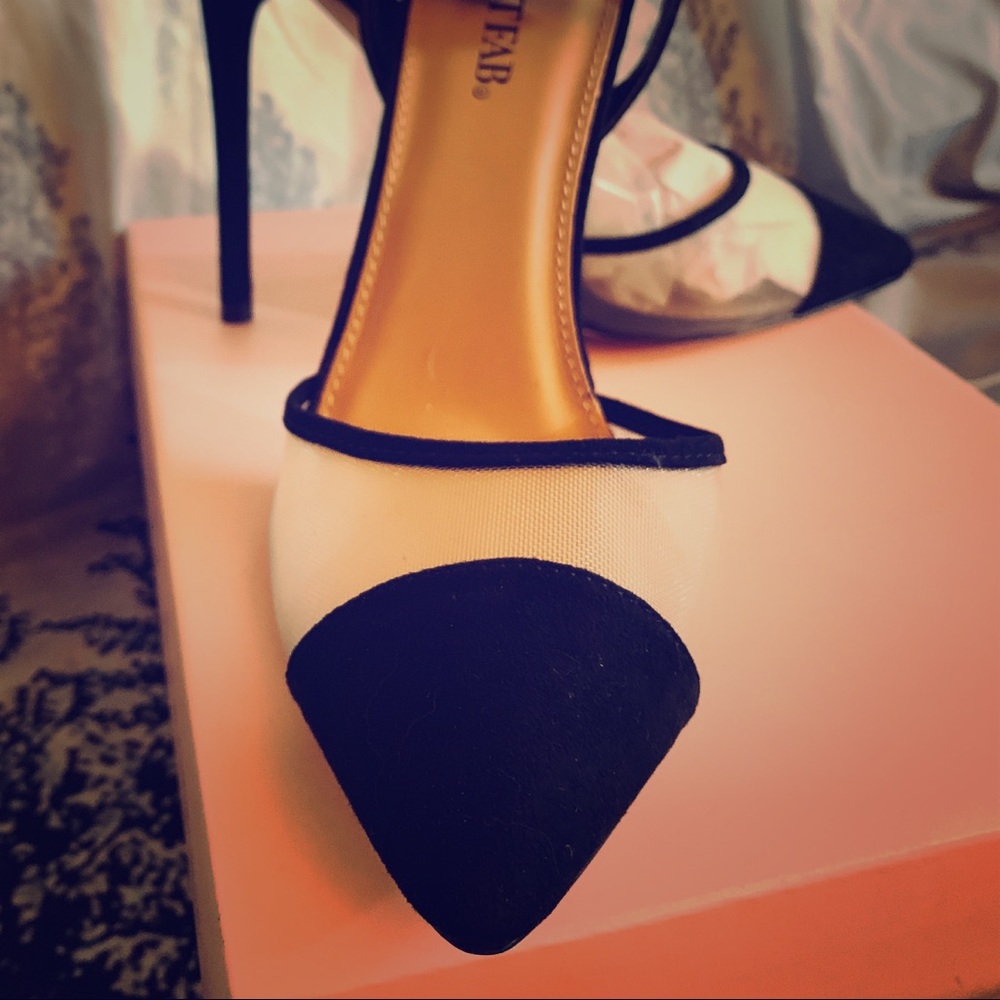 Black cap toe heels - Never worn - Discontinued.